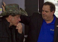 Photo by Daniel Conreras -  Ted Nugent and Bob Price discuss Obama Shooting Photo at Tactical Firearms before Piers Morgan interview